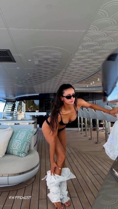 Nina Dobrev Tits on a Yacht